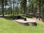 Awesome yard with firepit and water feature, great view of Terry Peak